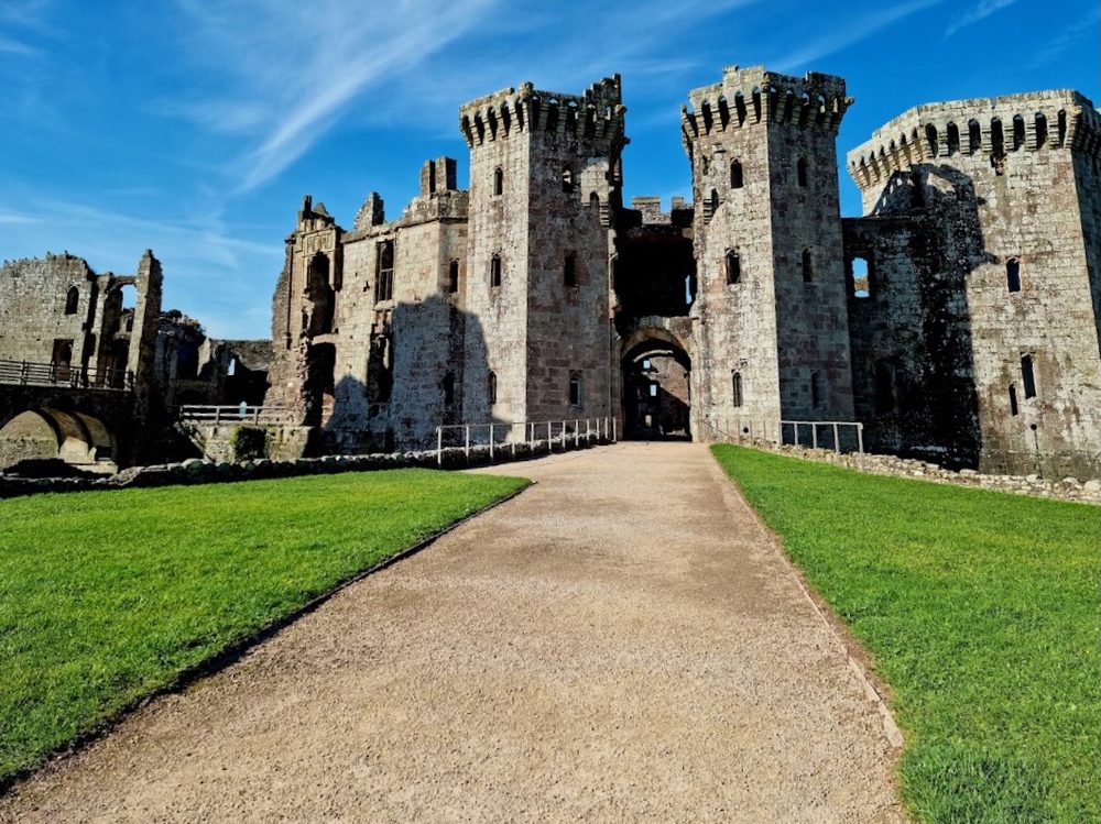 Raglan Castle, Monmouthshire - its moated Great Tower was deliberately undermined after the 1646 surrender, and stubbornly kept two of its sides.